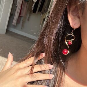 Elegant Gold and Red Swirl Earrings